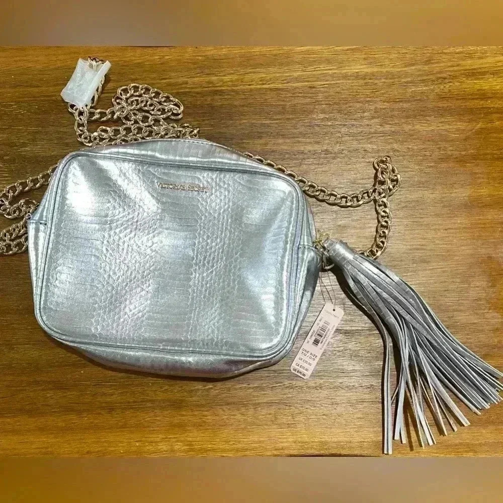 NWT Victoria Secret silver metallic crossbody bag with tassel
